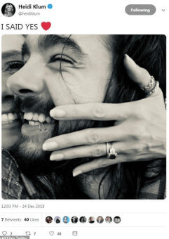 Heidi is showing her engagement ring
